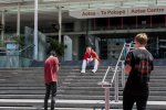 James Loan in action filming on the stairs of the Aotea Centre in Aotea Square Central Auckland.